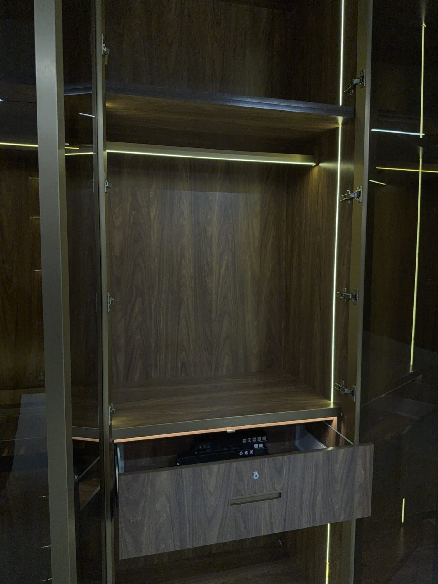 Brass and timber joinery detail by Amaza Homes
