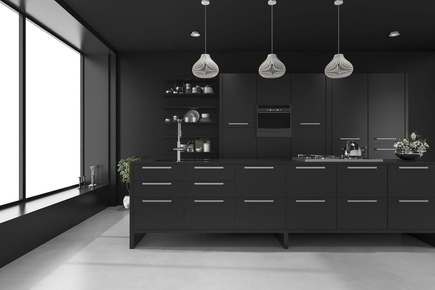 Black kitchen with brass inlay by Amaza Homes